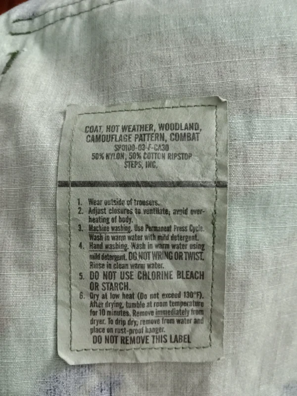 11 Chaqueta guerrera americana de camuflaje M81 woodland de la 94th Airlift Wing