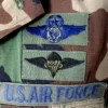 4 Chaqueta guerrera americana de camuflaje M81 woodland de la 94th Airlift Wing